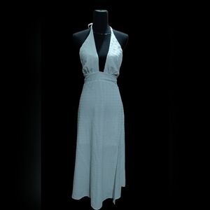 WHITE halter-neck maxi dress, plunging V-neck.